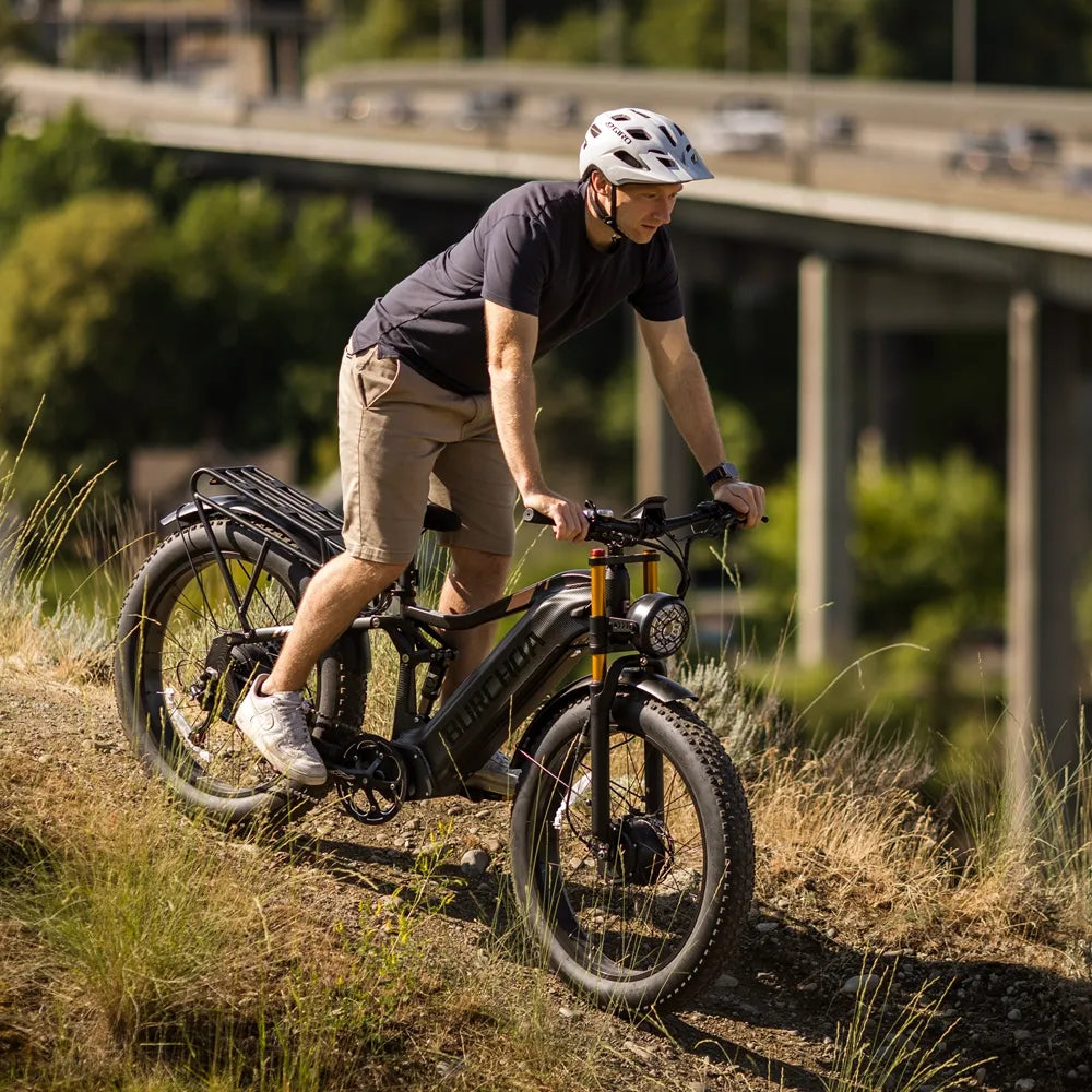 Rider on gravel trail with the Burchda HC26 — the ride between the truck and the backcountry