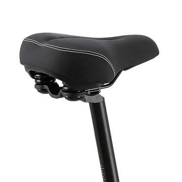 Close-up of the Burchda C35 wide comfort saddle with dual suspension springs and seat post