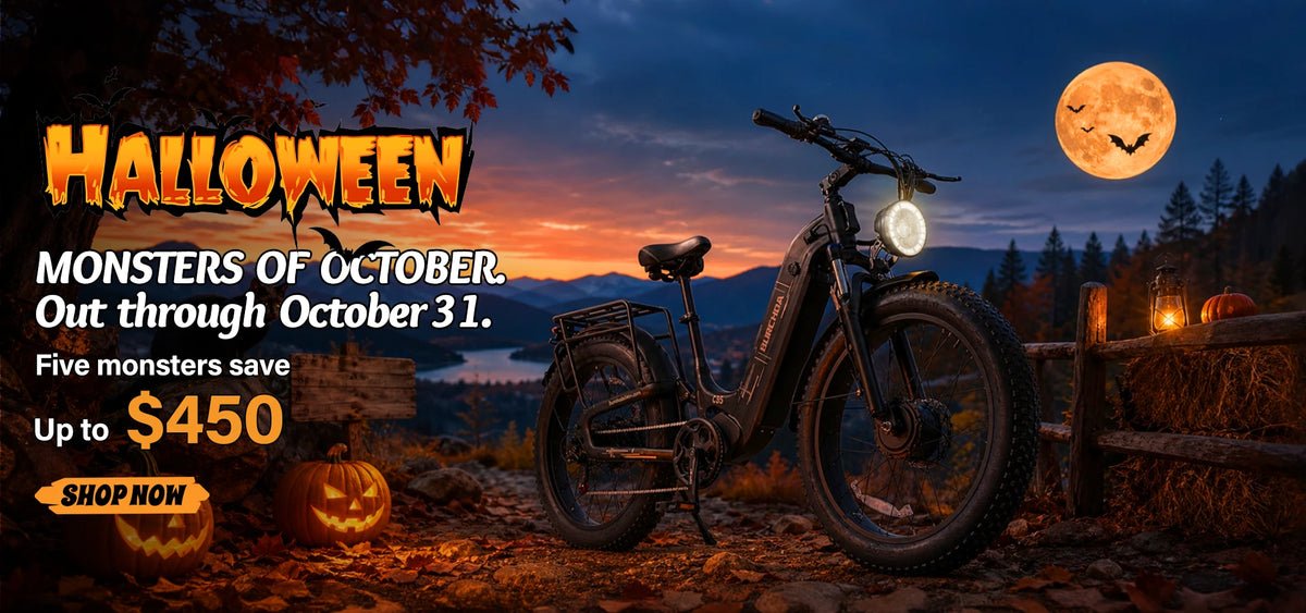A promotional Halloween advertisement featuring an electric bicycle in a mountain landscape at dusk, with text reading 'HALLOWEEN MONSTERS OF OCTOBER. Out through October 31.slider_item_cBjUET
