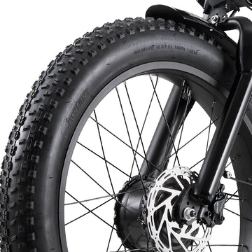 Close-up of the Burchda C35 front wheel with 26 x 4.0 fat tire, front hub motor and 180mm hydraulic disc brake