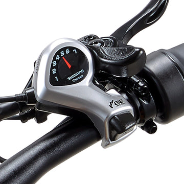 Close-up of the Shimano 7-speed index shifter on the Burchda C35 handlebar